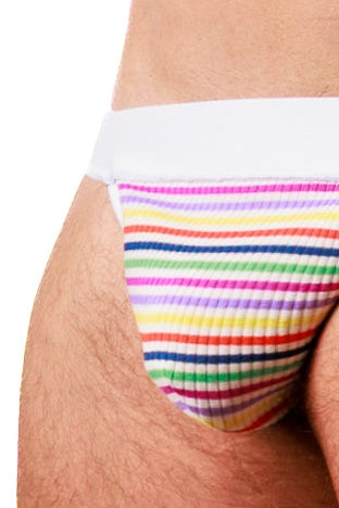 A muscular male model wearing low-rise men's briefs with a white waistband and a multicolor striped pattern on the front panel, set against a solid white background.